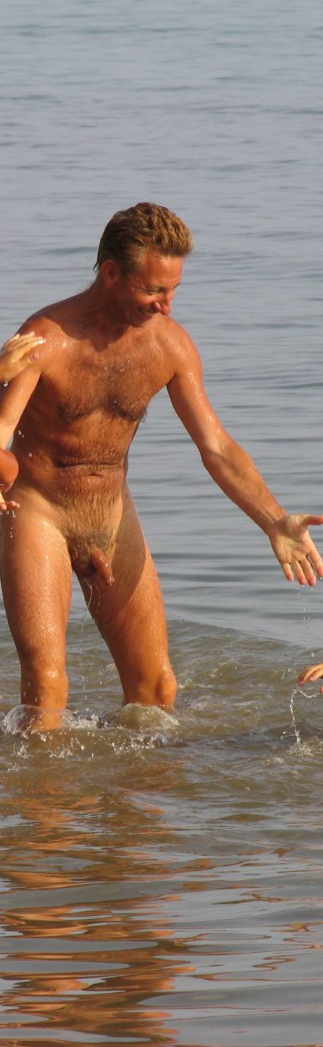 Sun-Kissed Skin and Joyful Splashing: A Father's Day Water Fight with His Two Boys - 2